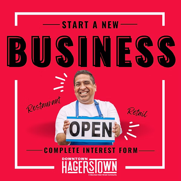 Smiling man in apron holds an "OPEN" sign. Text reads: "Start a new BUSINESS. Restaurant. Retail. Complete interest form. Downtown Hagerstown." Red background with white accents.
