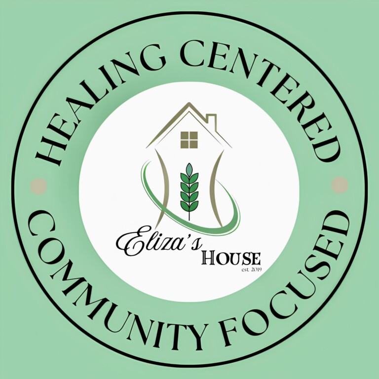 A green circular logo with a house, a leaf, and the text 