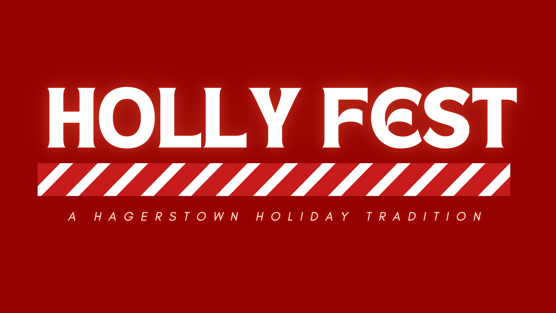 White bold text reading "HOLLY FEST" on a red background, with a diagonal red and white striped line underneath and smaller text below that says, "A Hagerstown Holiday Tradition." Celebrate the spirit of hollyfest with us!.