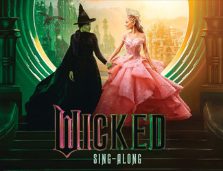 Two women stand holding hands; one is dressed in black with green skin, the other in a pink gown, crown and pale skin. Behind them is a magical city. The text reads "Wicked Sing-Along.
