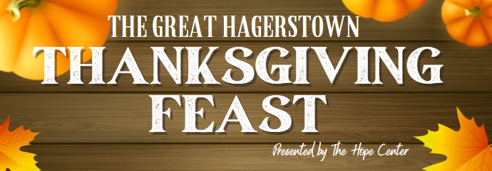 A wooden background with pumpkins and autumn leaves features the text: "The Great Hagerstown Thanksgiving Feast, presented by The Hope Center.
