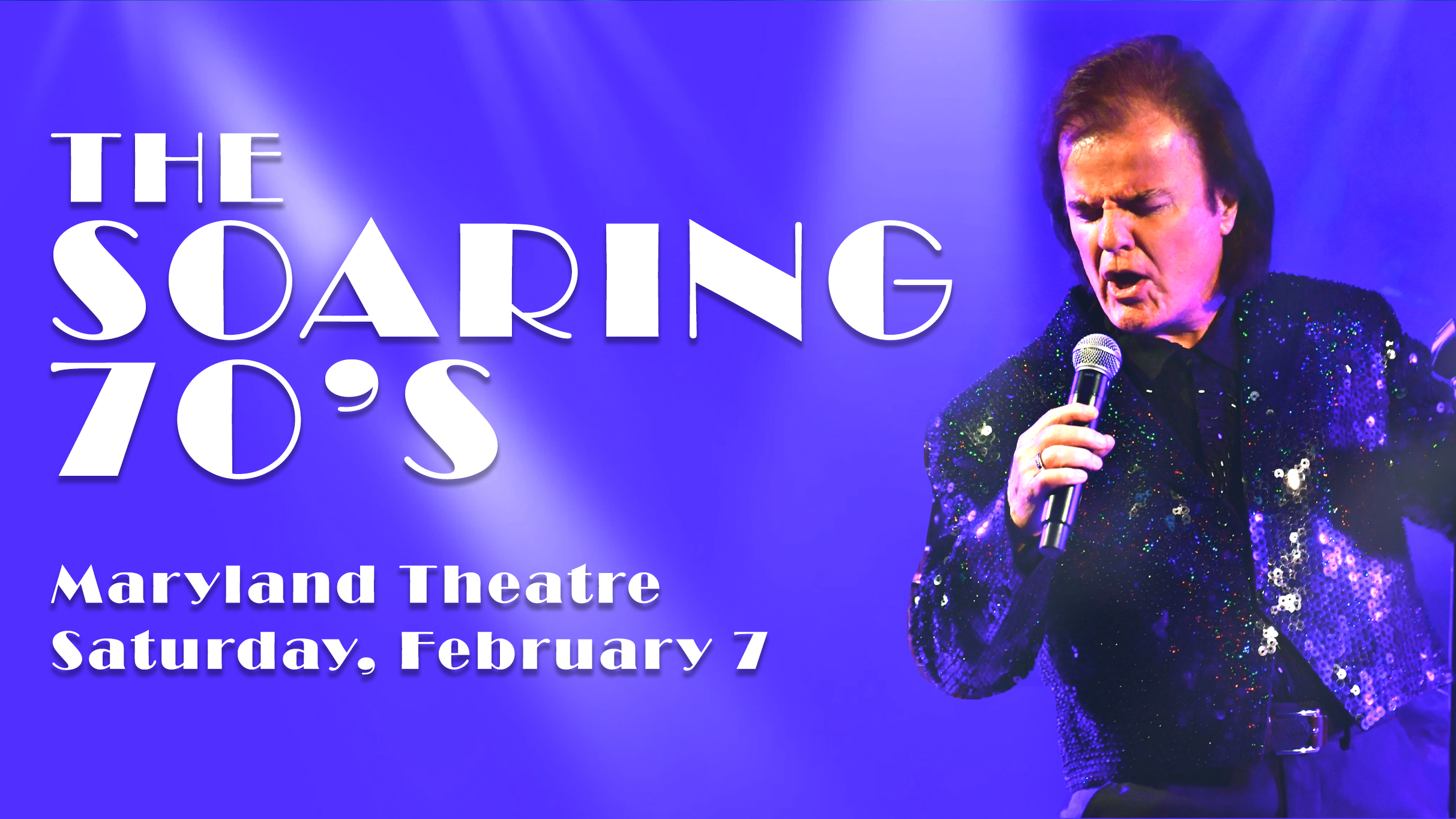 A man in a sparkly black shirt sings into a microphone on stage with purple lighting. Text reads: “The Soaring 70’s. Maryland Theatre. Saturday, February 7.”.