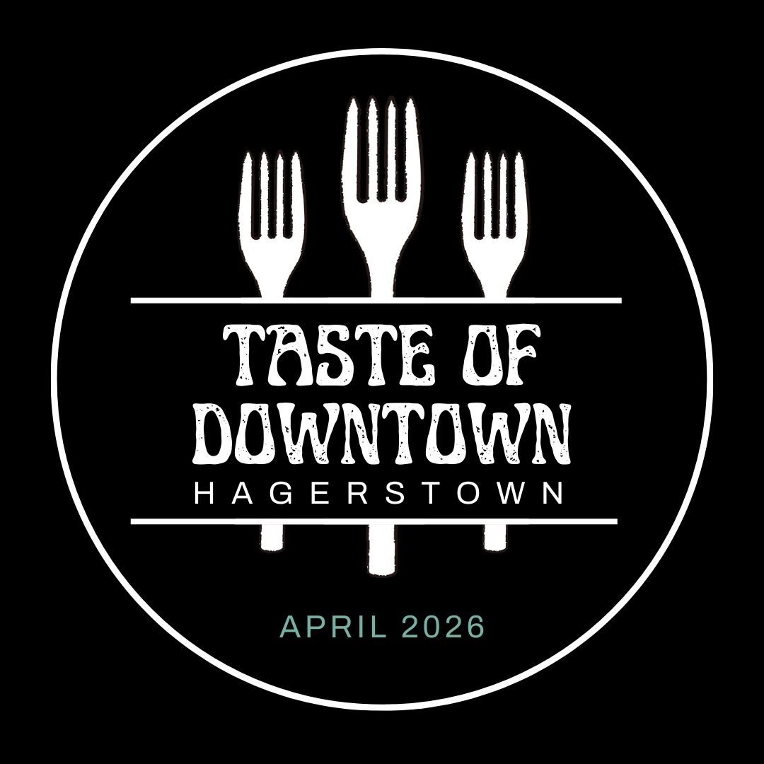 Logo with three upright forks and the text "Taste of Downtown Hagerstown" in white, inside a black circle. "April 2026" is written in green at the bottom.