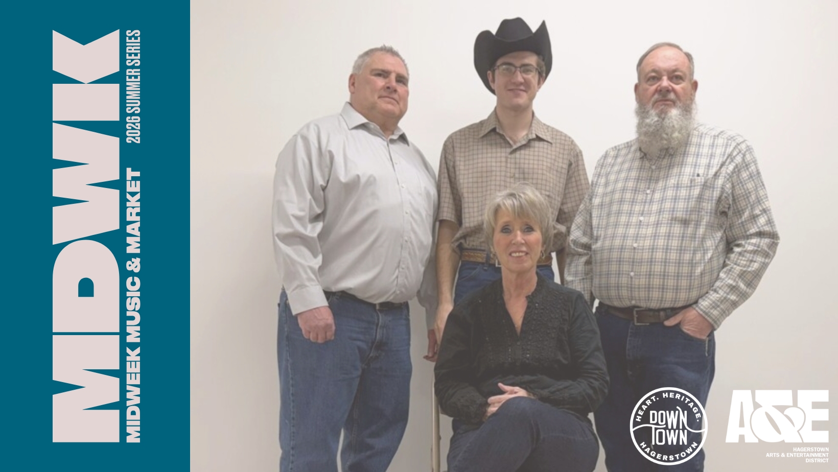Four adults pose in front of a plain background. Three men stand, one wearing a black cowboy hat and another with a long gray beard. A woman sits in front. Left text reads "MIDWIK Midweek Music & Market 2023 Summer Series.