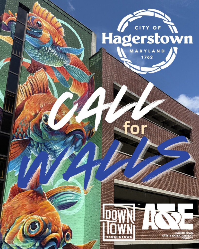 A vibrant mural of colorful goldfish on a brick building, featuring "City of Hagerstown Maryland 1762," a call for walls, and Downtown Hagerstown and Arts & Entertainment District logos.