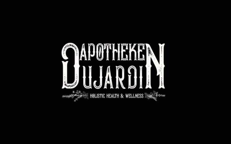 White gothic text that reads 'Apotheke' at top, then 'DuJardin' on the bottom with the 'D' and 'N' larger than the rest of the text to create seamless rectangle. the very bottom of logo reads, 'holistic health & wellness and has simple greenery on either side.